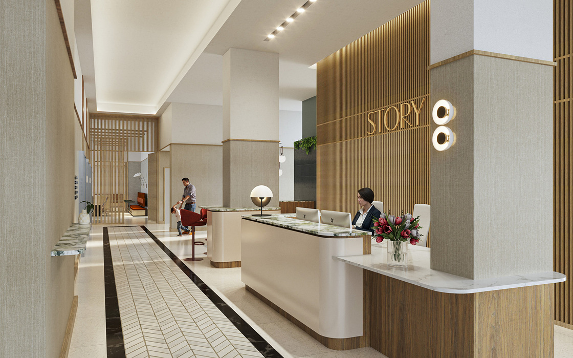 Residential lobby with a marble reception desk, wood-slat wall and "STORY" sign.